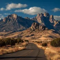 a road in front of mountains
