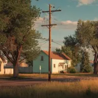 bungalow near a utility line and some trees