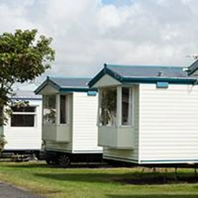 row of white mobile houses