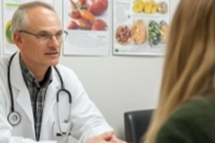a male nutritionist with a patient