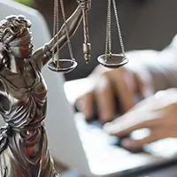 woman lawyer sitting at a desk