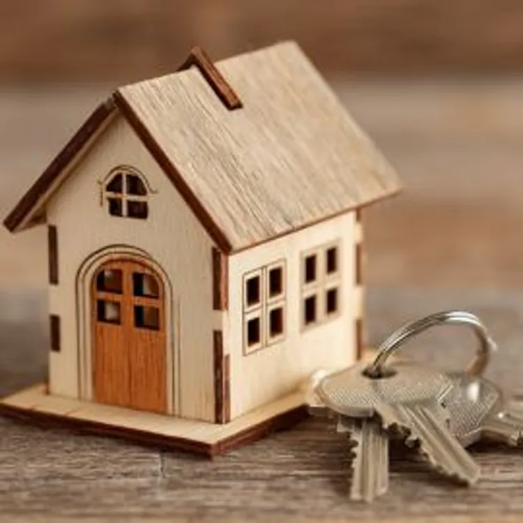 keys beside a house