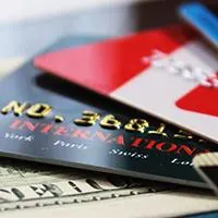 money and credit cards on table