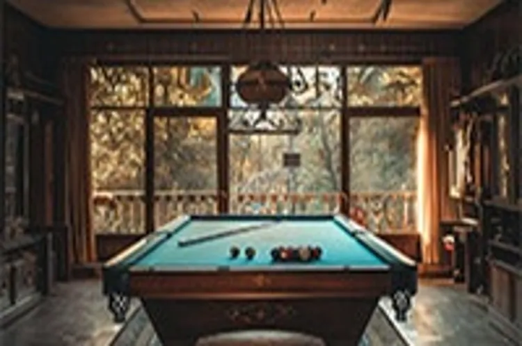 a pool table in a home game room