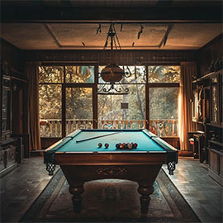 a pool table in a home game room