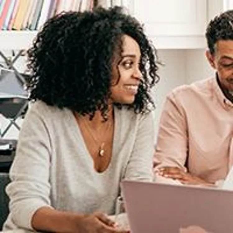 couple meeting with mortgage lender