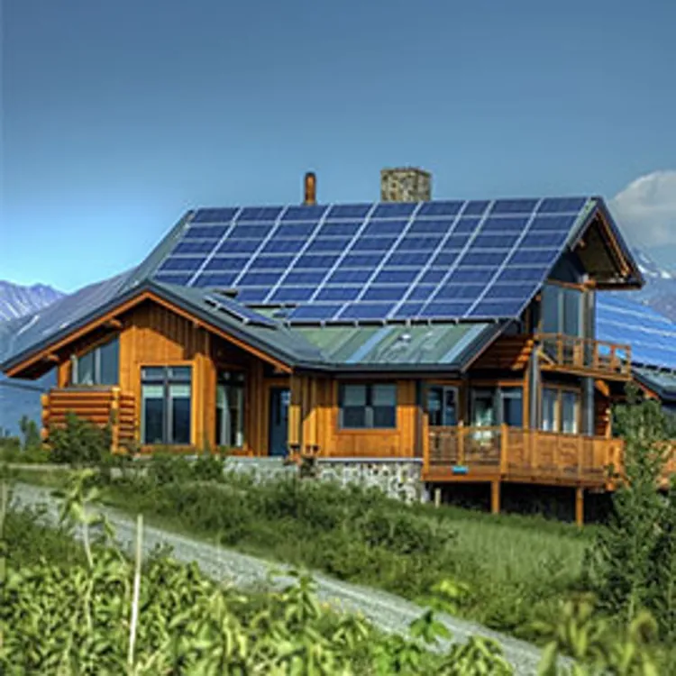 solar panels on the roof of a large house