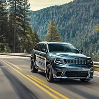 jeep grand cherokee along a mountain road