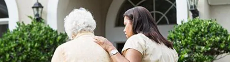 woman walking next to older woman