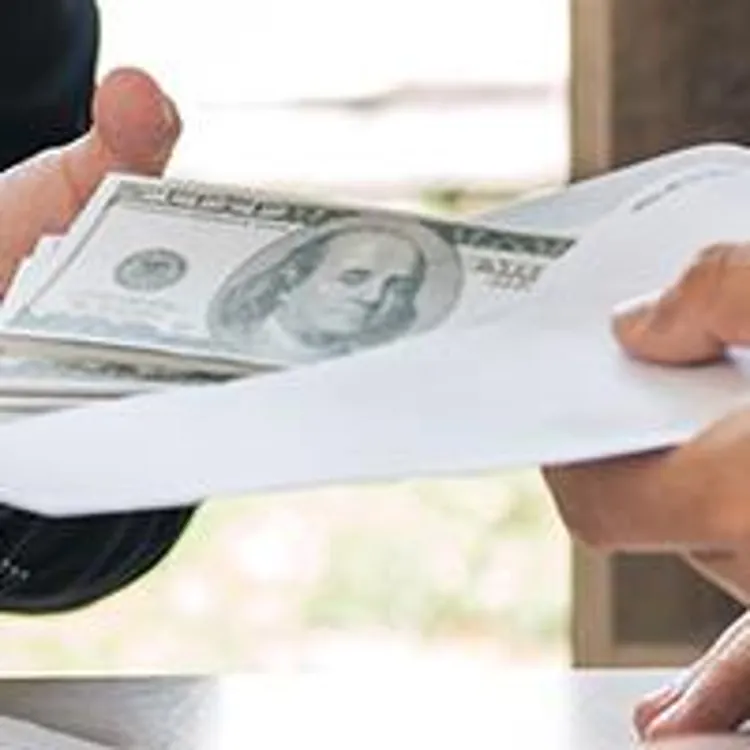 lender handing over money