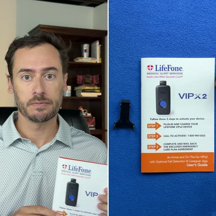 Chris Kolmar holding the LifeFone VIP X2 user guide beside the system laid out: pendant on its lanyard in the charging dock, belt clip and guide