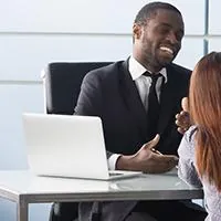 loan officer speaking with couple