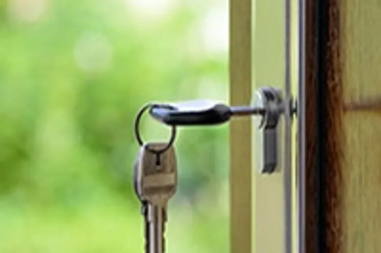 key hanging from front door