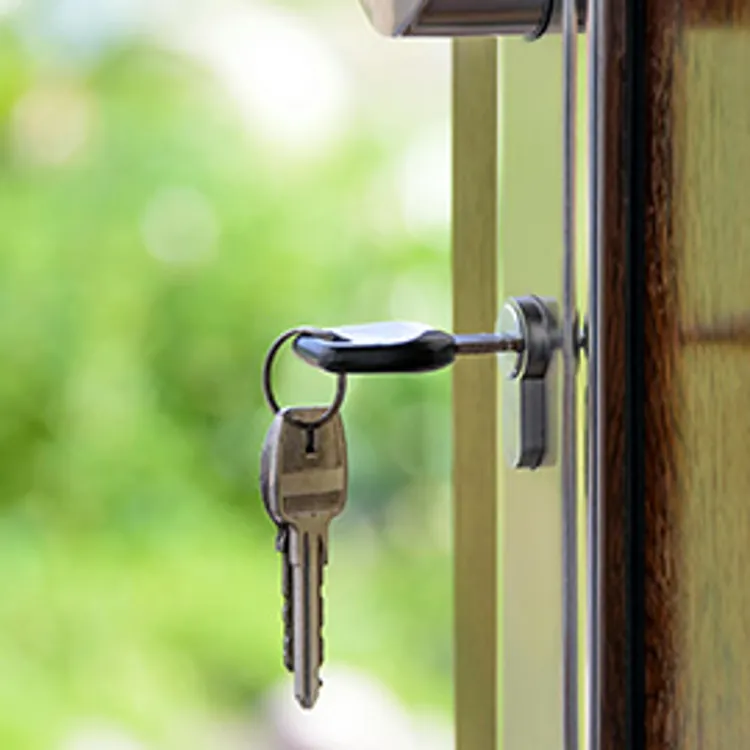 key hanging from front door