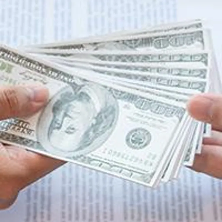 man receiving money from buisnessman