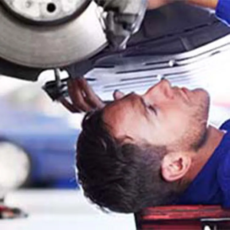 man working on car