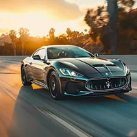 a maserati traveling along a highway