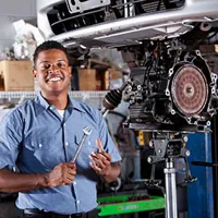 mechanic working on transmission