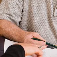 couple filling out medigap paperwork