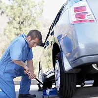 mechanic fixing a car