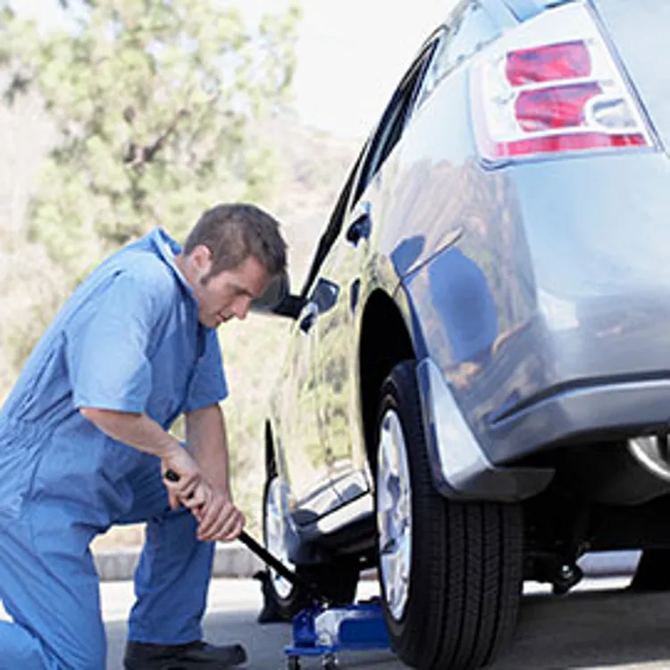 mechanic fixing a car