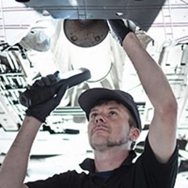 mechanic fixing a car
