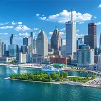 tall buildings near a body of water in a michigan city