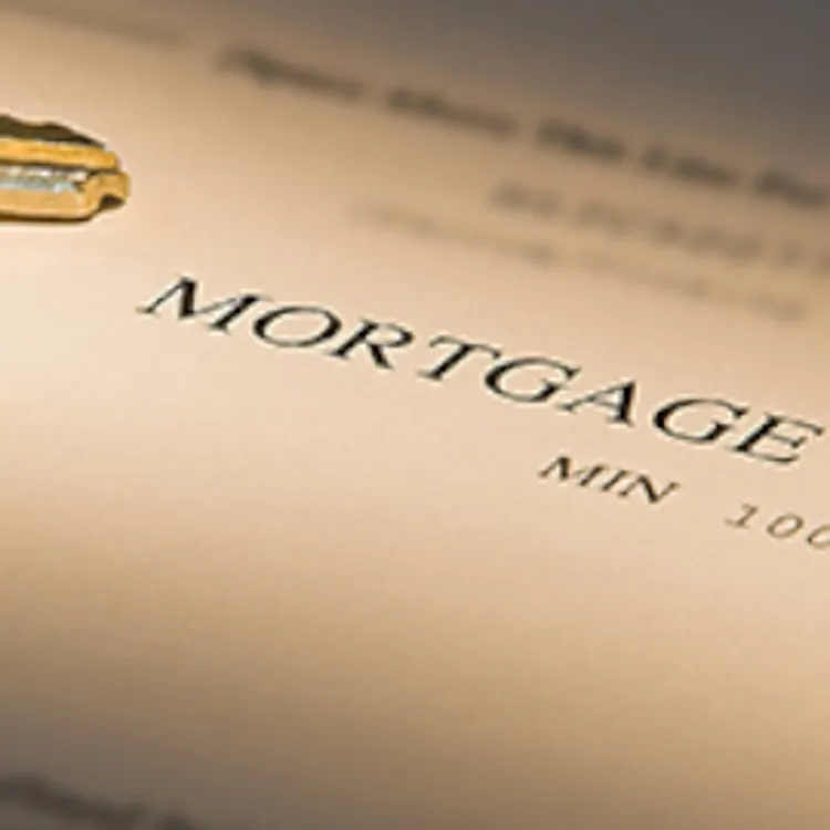 mortgage paperwork with house keys