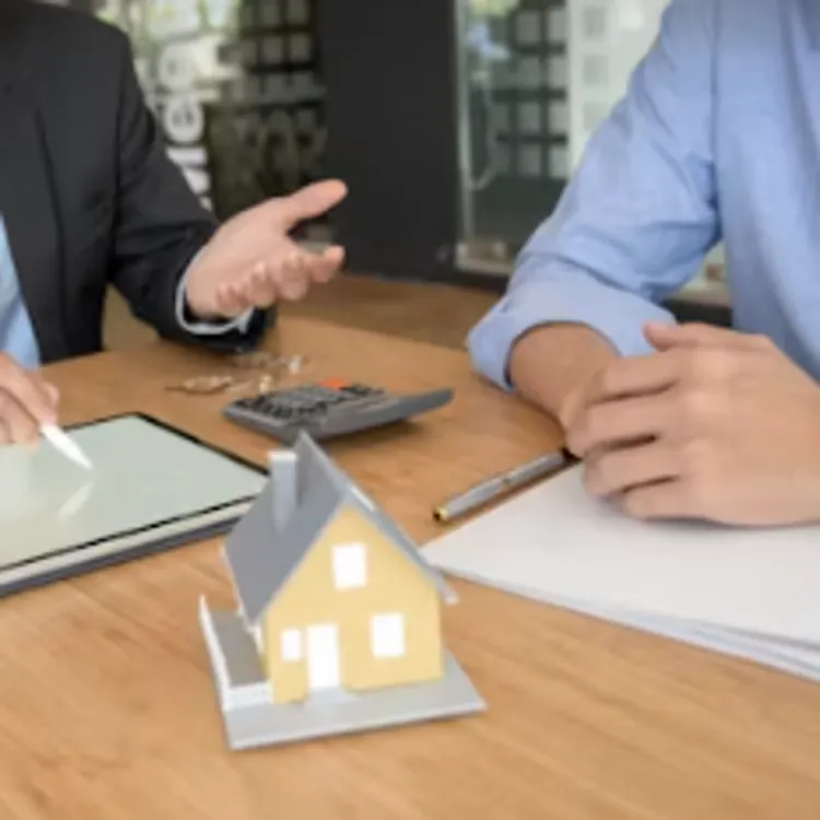 Discussing mortgage options and home buying at a financial consultation