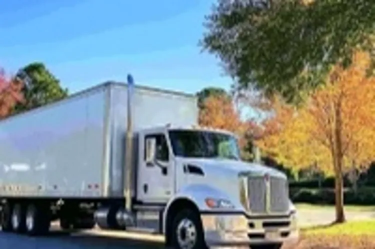 a moving truck parked on an Arkansas street