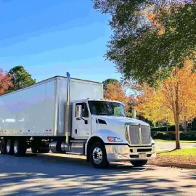 a moving truck parked on an Arkansas street