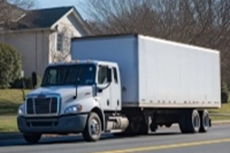 a moving truck parked on a street in Maryland