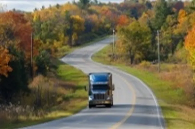 a moving truck on a highway in Michigan