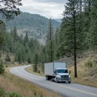 a moving truck on a highway in Montana