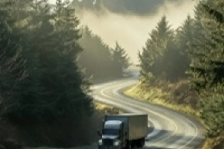 a moving truck on a highway in Oregon