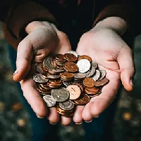 two hands full of coins