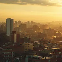 afternoon sun casting a yellow glow at city buildings