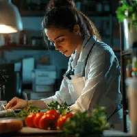 Nutritionist dressed in white preparing raw ingredients