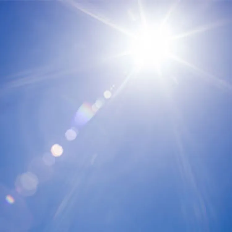 Lens flare sunlight and clear blue sky
