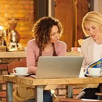 business owner talking to financial advisor