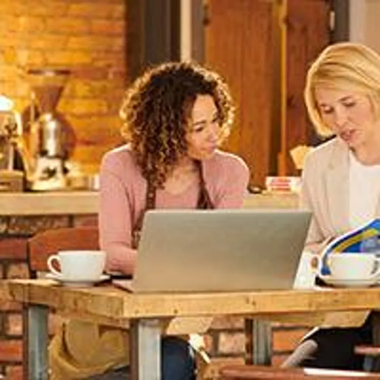business owner talking to financial advisor