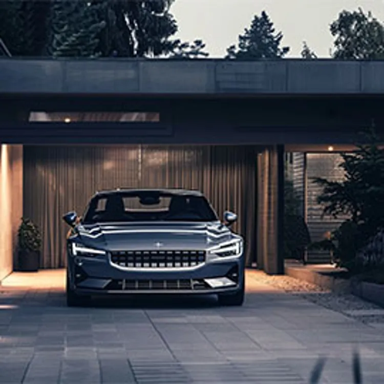 a polestar car parked in a home garage