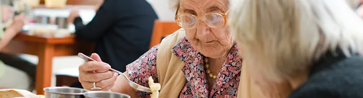 senior woman enjoying meal