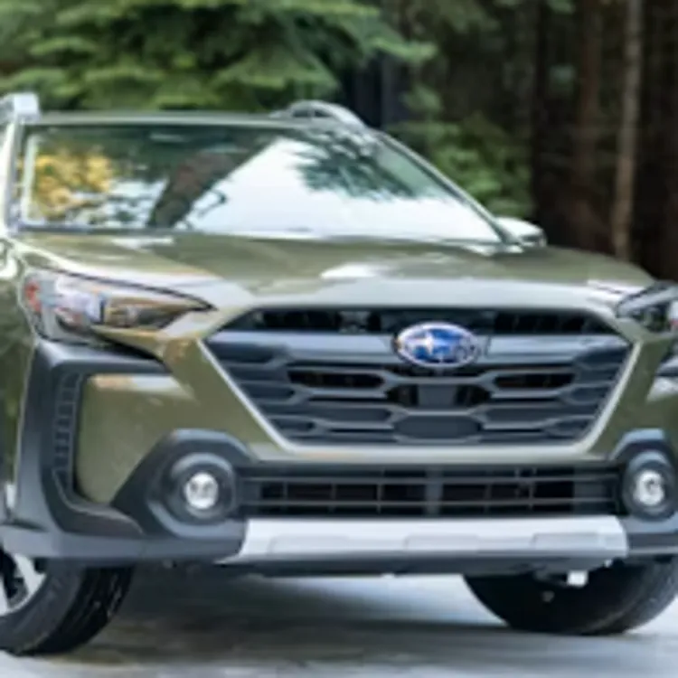 Exploring winter roads with a reliable SUV in a forest setting.
