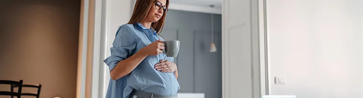 pregnant woman drinking tea