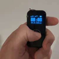 Thumb pressing and holding the SecuLife SOS button until the screen switches to calling