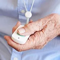 senior pushing medical alert