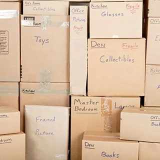 stack of labeled moving boxes
