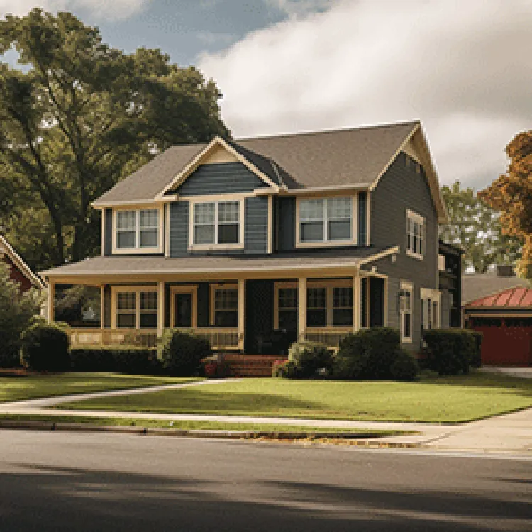 big two-story grey house with lawn