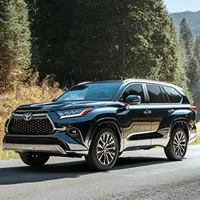 black crossover suv on on a road